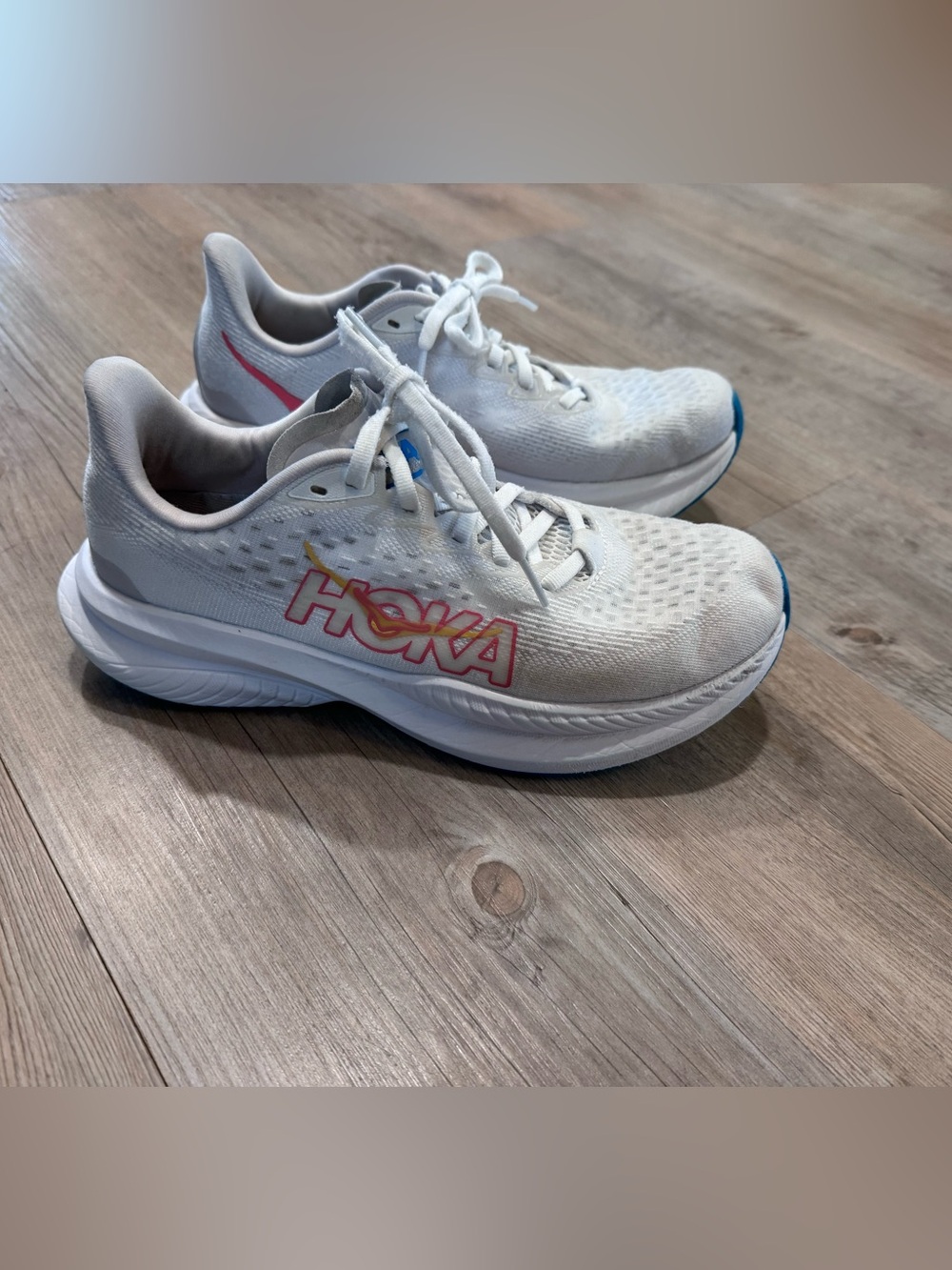 Hoka Women's White Running Shoes with Pink and Blue Accents